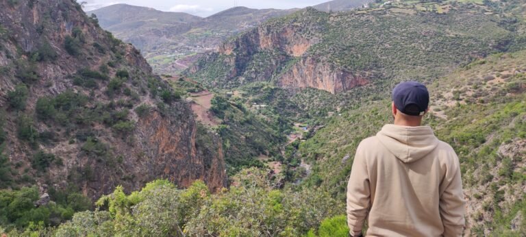 A breathtaking panoramic view from a mountain top in Akchour,overlooking lush valleys and winding streams. This majestic vista is the ultimate reward after completing the scenic Akchour waterfalls hike, where the mountains meet the sky in an unforgettable natural masterpiece.